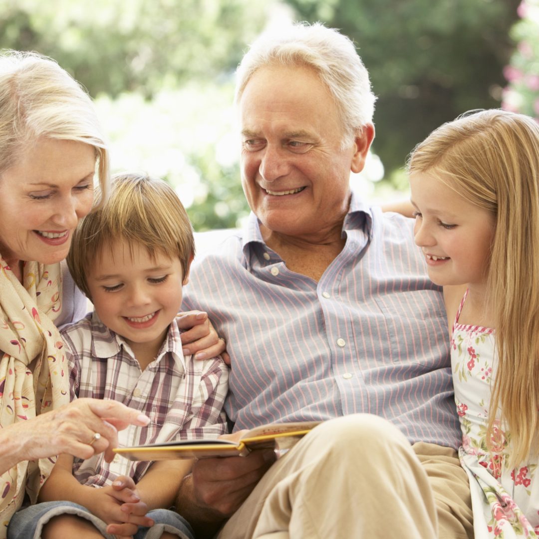 imgi_1_elderly-couple-reading-two-kids-1.jpg